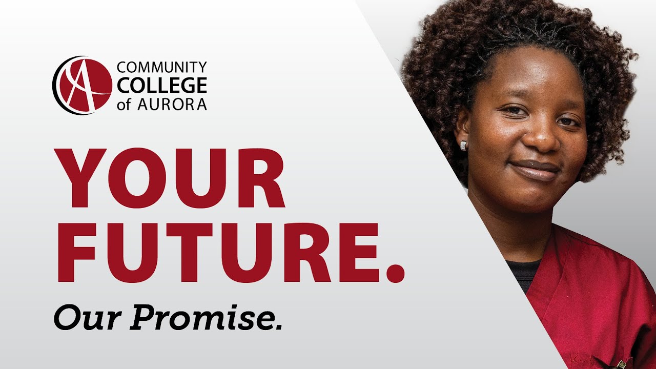 Woman smiles behind Your Future slogan
