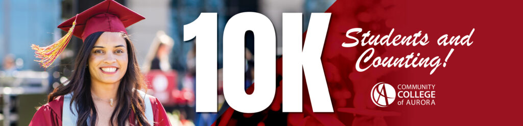 A smiling graduate in a cap and gown stands outdoors. Large text reads "10K Students and Counting!" with the Community College of Aurora logo. Celebratory tone.