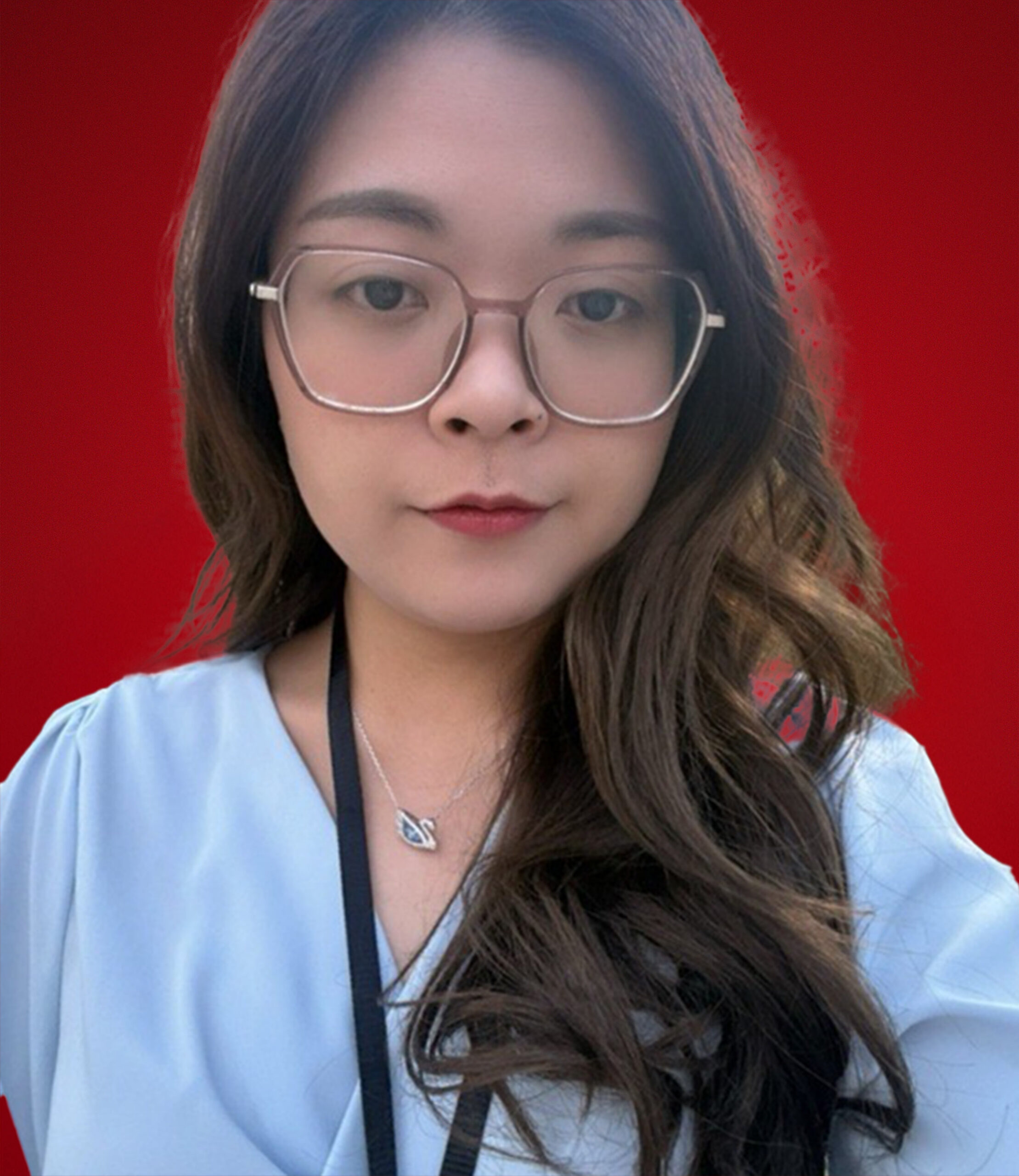 Photo of Nina Tran over a red background.