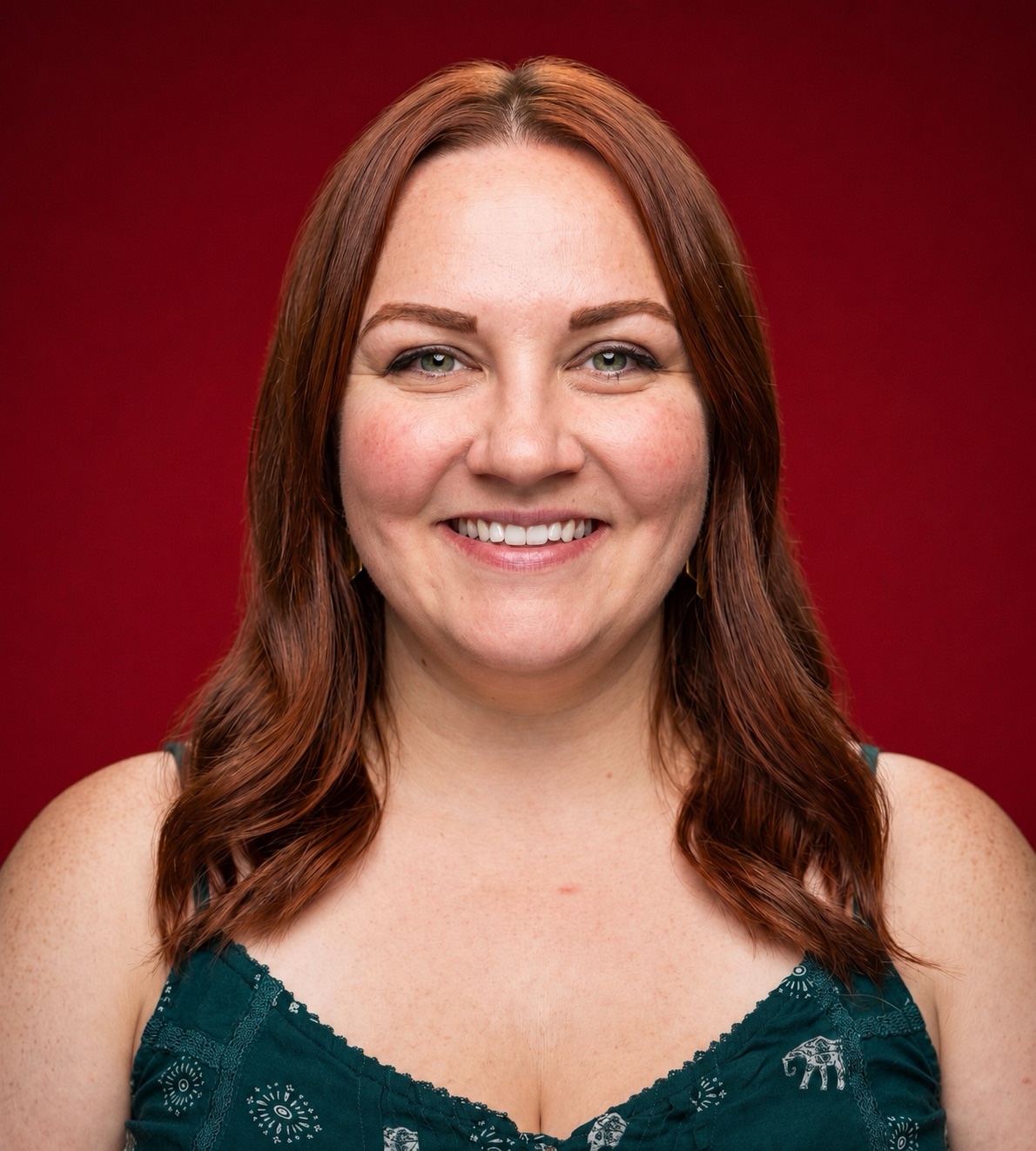 Photo of Allison Stepntiz over a red background.